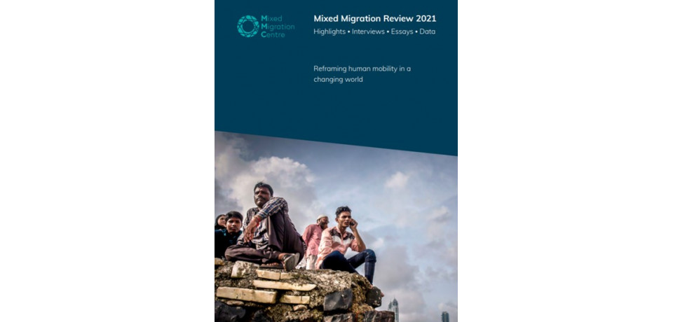 Cover page of the Mixed Migration Review 2021, people sitting on a rock