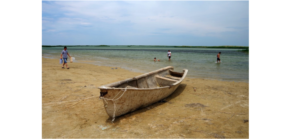A rowboat stranded on the beach