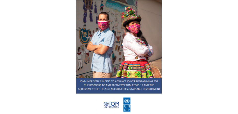 Cover of the IOM-UNDP Seed Funding Round 2 Report, with two people crossing their arms over their chests in front of a mural in Peru
