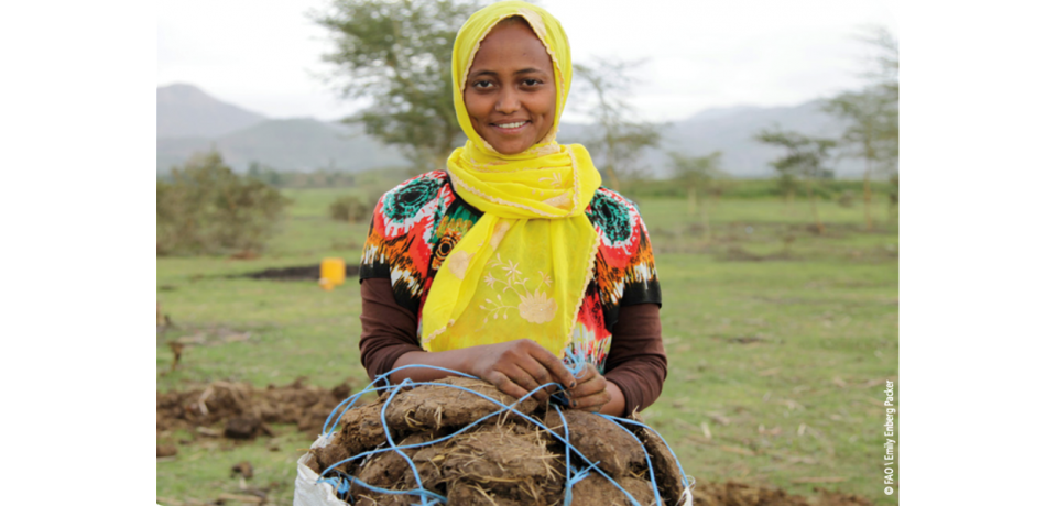 A young women performing agricultural work