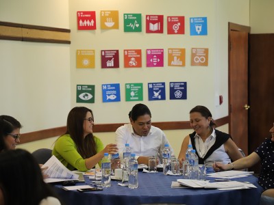 Image of four people in a training in Ecuador