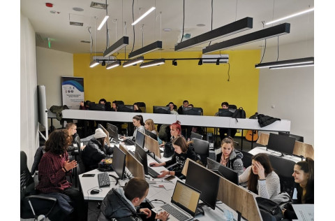 Young people attending a computer training session