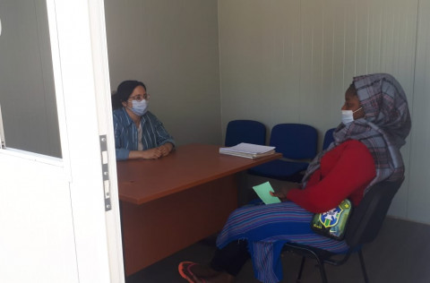 Image of a woman is having a consultation session with a therapist.