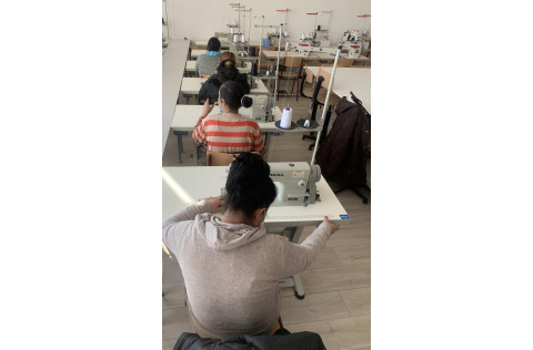 women learning sewing
