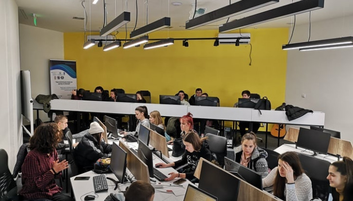 Young people attending a computer training session