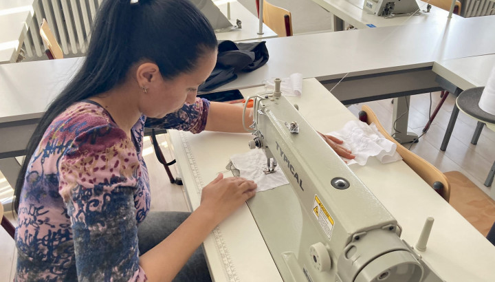 A student sewing
